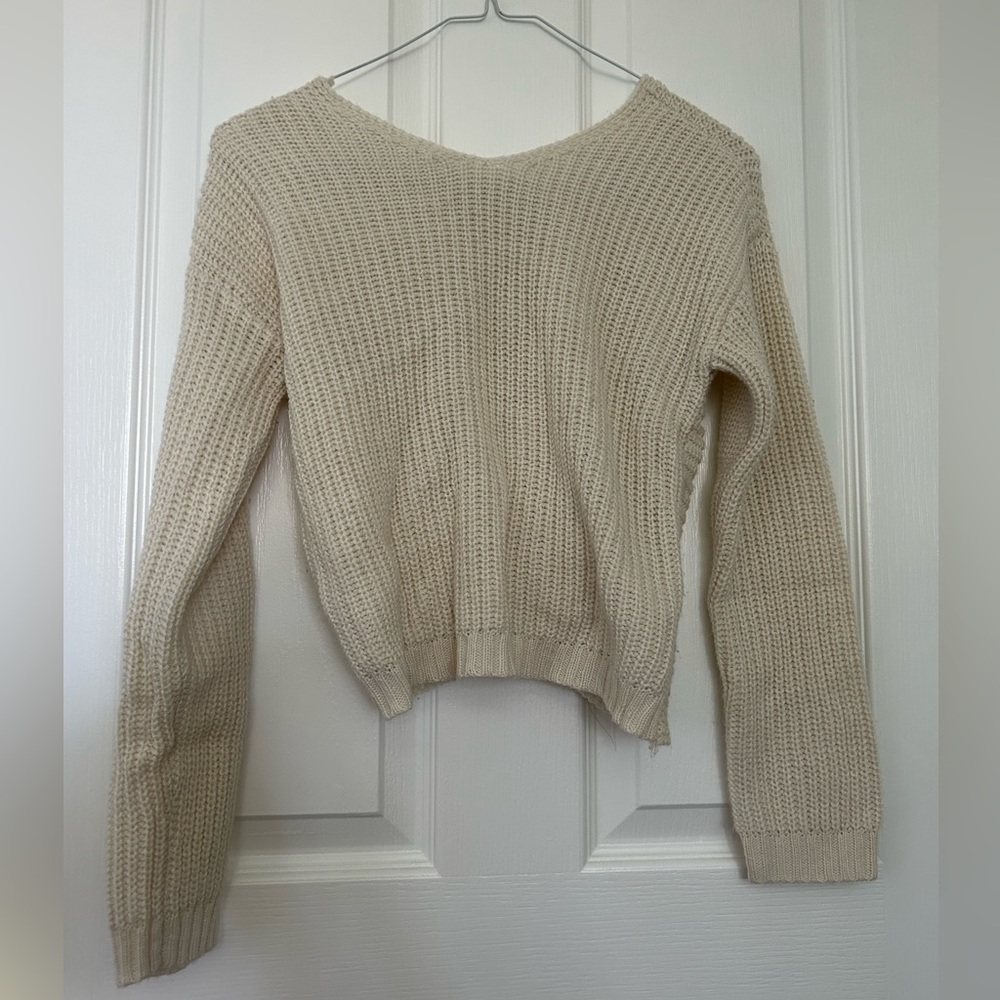 teen white long sleeve sweater.